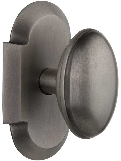 Arched Rosette Door Set with Homestead Knobs in Antique Pewter.